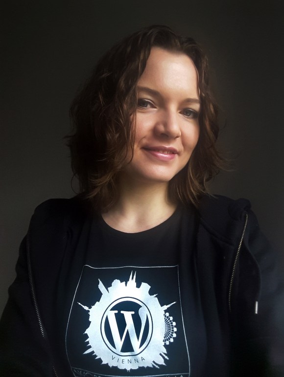 Olga with a WordCamp Vienna t-shirt