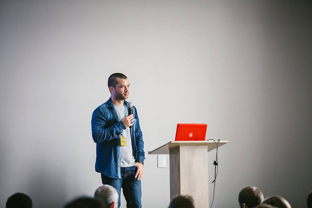 Leo speaking at the podium at WordCamp Cape Town in 2016